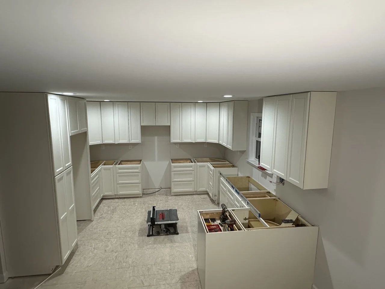 Kitchen cabinetry during installation